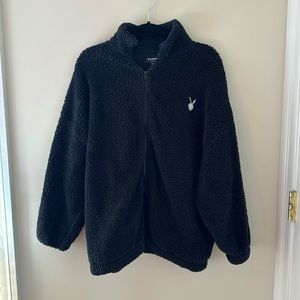 oversized black playboy fur jacket